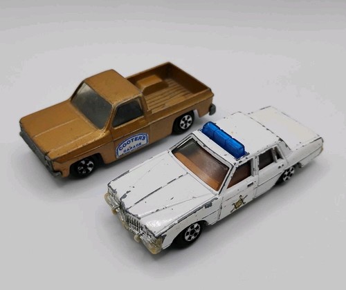Vintage 1981 ERTL Cooter's Garage Fleetside Pickup and Bonneville Police Car - Afbeelding 1 van 6