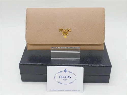 Portefeuille long Prada Saffiano double bouton pression beige authentique