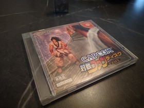 Capcom vs SNK Millennium Fight 2000 Ken Silver Lighter w/ Dreamcast fan disc