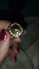 Gold over stainless with CZ accents praying h...