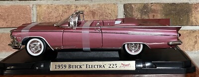 1959 BUICK ELECTRA 225 CONVERTIBLE ROSE 1:18 SCALE BY ROAD