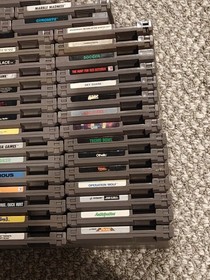 Huge NES 50 Game Lot Super Mario Tetris 1943 Blaster Master Rad Racer