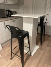 Pedestal table and two bar chairs