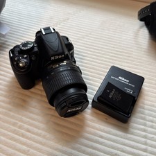 Nikon D3100 14.2MP Digital SLR Black w/ 18-55mm Lens and one battery