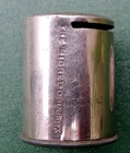 THE "MIDGET" SAVINGS BOX, A CYLINDRICAL TUBE FOR 10 SIXPENCES OR SOVEREIGN COINS