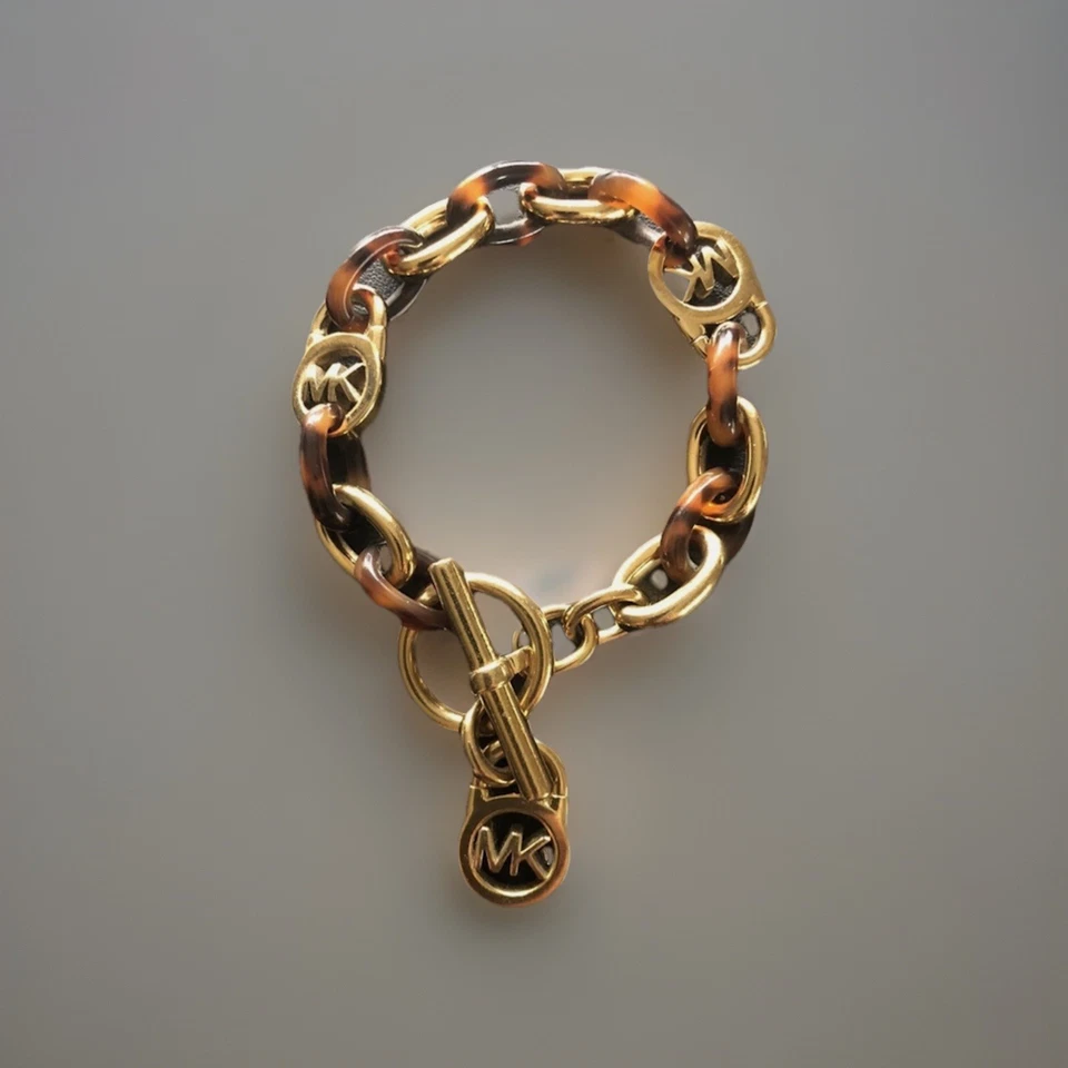 "Brazalete Michael Kors imitación caparazón de tortuga MK eslabón de palanca tono dorado, 6 3/4""" Foto 4 de 4