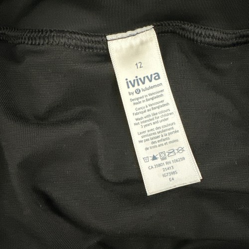 ivivva by Lululemon girls size 12. Black and white striped. Zipper side pockets. - Picture 5 of 5