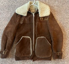 SCHOTT BROWN LEATHER RANCHER/BIKER SHEARLING JACKET, SIZE 36.