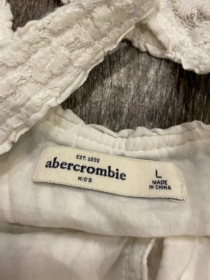 Camiseta sin mangas Abercrombie niños niñas L blanca con cordones abotonados A&F usada en excelente estado 8-33 Foto 3 de 3