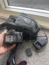 Canon EOS 1000D 10.1MP DSLR Camera with EF-S 18-55mm Lens