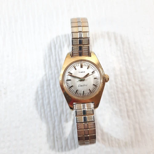 Vintage Timex Electric Watch Gold Tone Round stretch Automatic For repair/READ