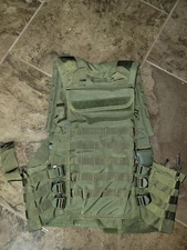 TACTICAL VEST W/ AMMO POUCHES REAR POUCH MAYBE FOR PLATE? GEAR OR WATER BLADDER?