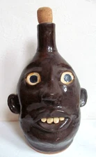 Eldreth face jug Redware pottery w/ handle Buckteeth Googly eyes Large ears 11"