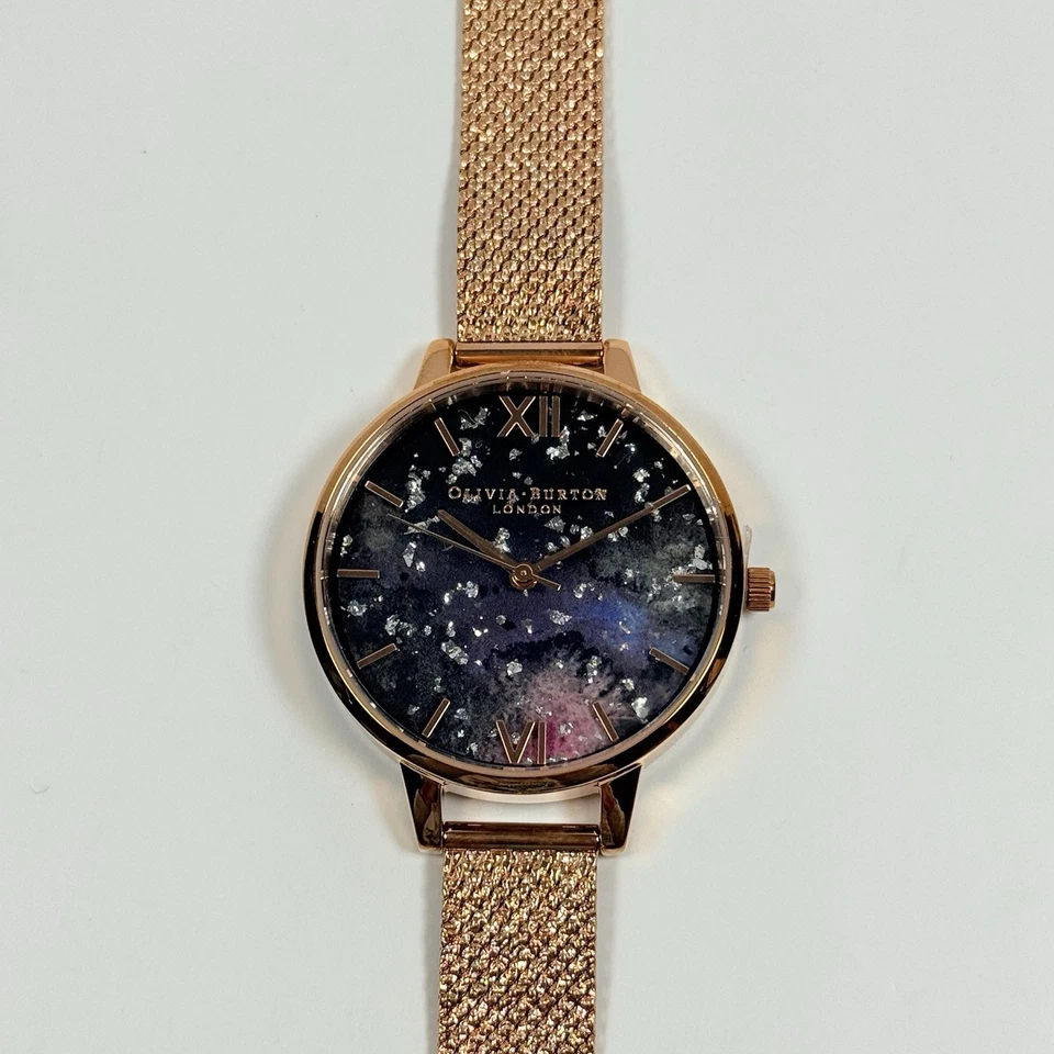 Reloj para mujer Olivia Burton esfera celeste oro rosa malla Boucle OBW0651 Foto 3 de 4