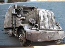 Highway truck collectable belt buckle. Maybe a Peterbilt  Shows' worn condition