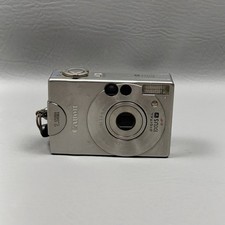 Canon Digital Camera IXUS V 2.1MP Silver Point and Shoot Auto Focus PC1012