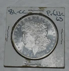 ONE (1) US "CARSON CITY" MORGAN DOLLAR (1881-CC) GEM BU/PL (MS-63), Sealed
