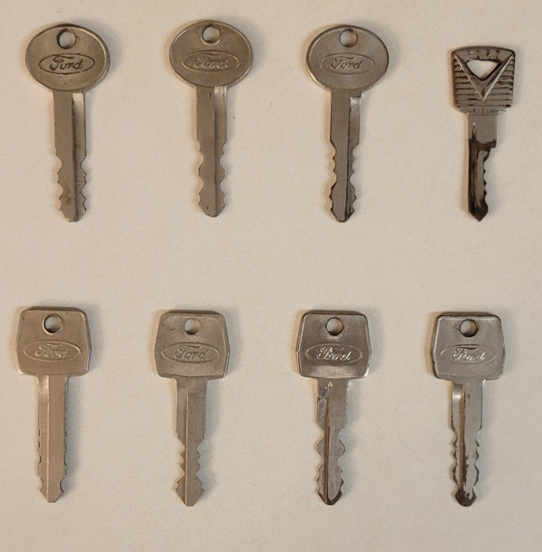 8 VINTAGE FORD KEYS CARS TRUCKS INCL. EARLY FORD “H” KEY AUTOMOTIVE MEMORABILIA