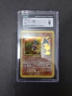 1999 POKEMON BASE SET CHARIZARD CGC 9