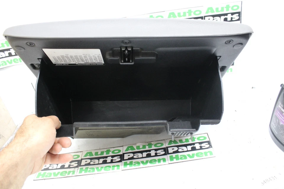 02-05 Trailblazer Envoy - Guantera gris pestillo de puerta y manija desbloqueada con llave OEM Foto 3 de 4