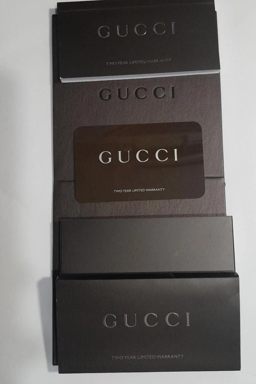 Montre GUCCI carte de garantie internationale pour collectionneur (non remplie) avec livret