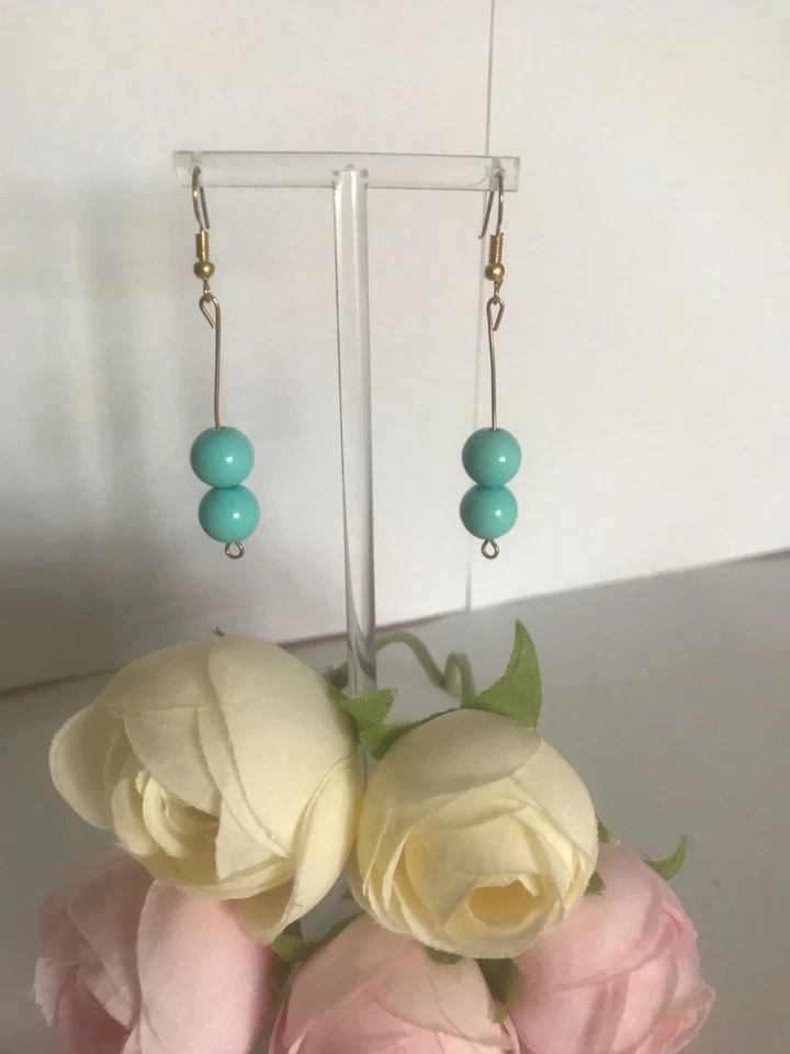 Boucle d'oreille à perle bleu nacrée - Photo 1/1