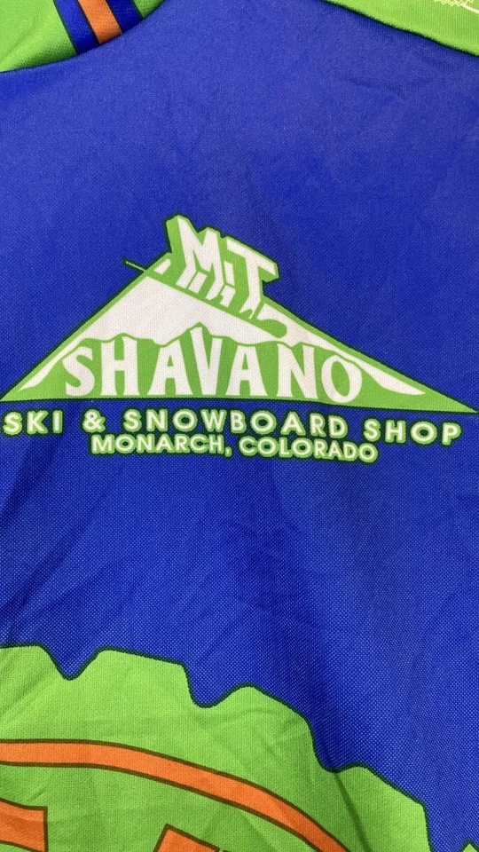 Camisa de ciclismo feminina Sugoi Absolute Bikes azul média verde zíper completo Salida CO - Imagem 2 de 4