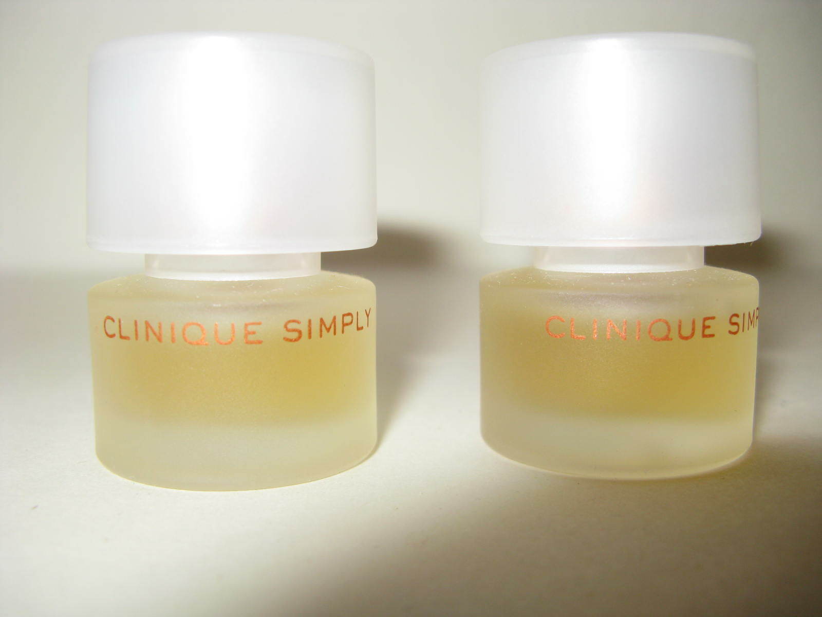 Lot of 2 Discontinued Clinique Simply parfum 0.14oz.each,spr