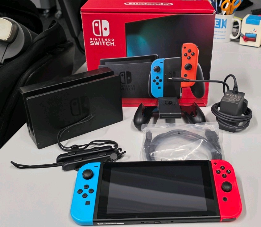 Nintendo Switch Console - Red & Blue - 32GB + 64GB Storage | eBay UK