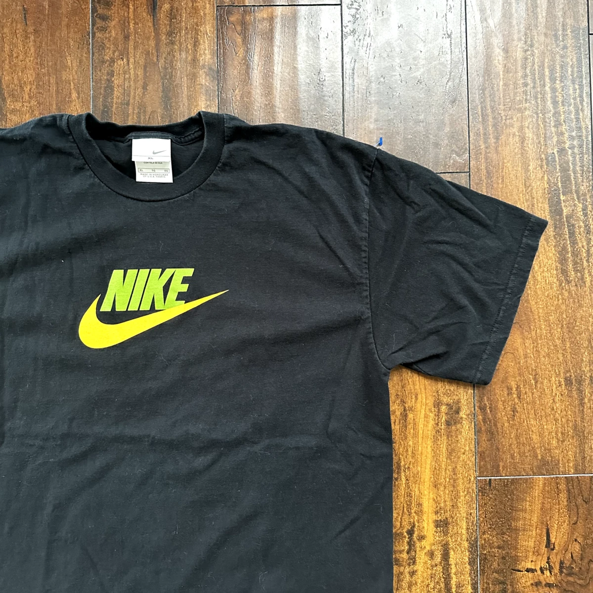 Yellow Nike Logo