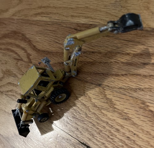 Tractor cargadora y retroexcavadora Ertl Ford 1/64 construcción de juguete fundido a presión de colección 🚧 - Imagen 10 de 10