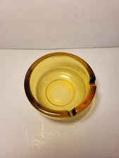 Vintage 3.75” Amber Glass Cigarette Ashtray Round 2 Slot Rounded Bottom Abstract