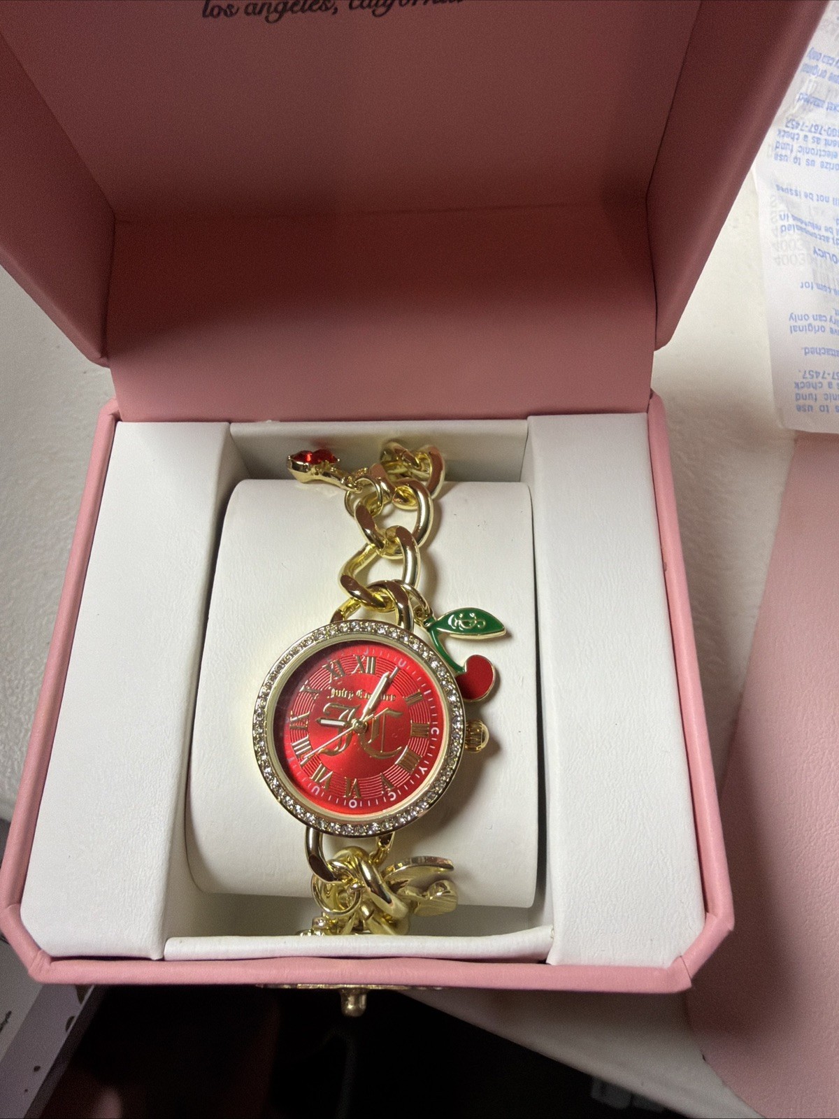 Juicy Couture Gold tone Cherry Charm Bracelet Watch