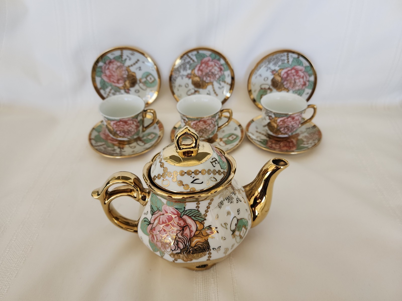 10 Pc Floral Design Teapot, 6 Saucers, 3 Cups Ceramic w/Gold Accents 16 oz/3 oz 