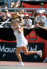 Monica Seles of Yugoslavia hits a return at a women's singles matc- Old Photo 19