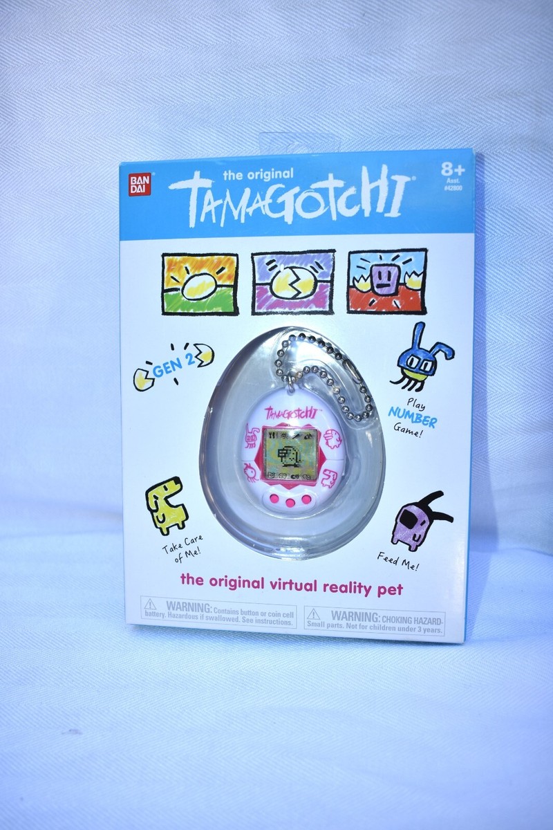 TAMAGOTCHI GEN 2 ENGLISH WHITE WITH PINK CHARACTERS BANDAI VIRTUAL
