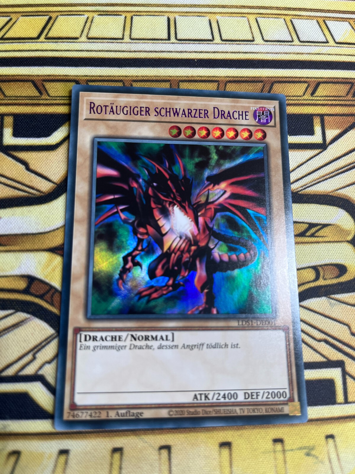 Yugioh Karte - Rotäugiger Leuchtfeuer-Metalldrache Gold Rare DE + Ultrapro Toploader