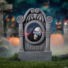 22  Gray Tombstone with Light-Up Moving Skeleton Head Halloween Decoration