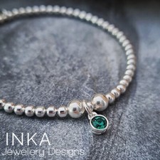 Inka 925 Sterling Silver stretch bead Bracelet with May Emerald Birthstone charm