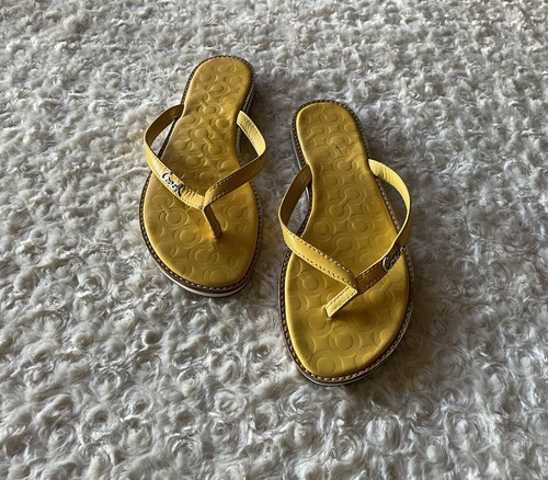 yellow coach flip flops
