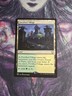Fortified Village Commander: Phyrexia: All Will Be One Regular