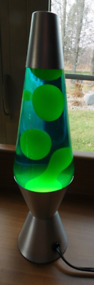 LAVA LAMP GREEN AND YELLOW WORKING WELL AND CLEAN ALONG WITH NEW