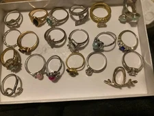 A Mixed Lot Of 20 Costome Rings Different Sixes Goldtone And Silvertone 