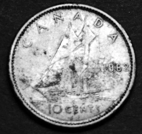 1962 10¢ silver coin with toning