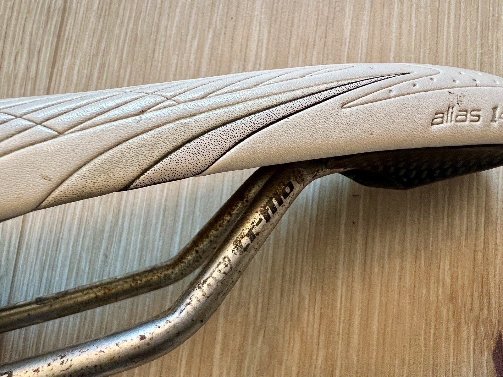 Specialized Alias 143mm Bicycle Saddle, White, Carbon Bottom, Hollow CR-Mo Rail