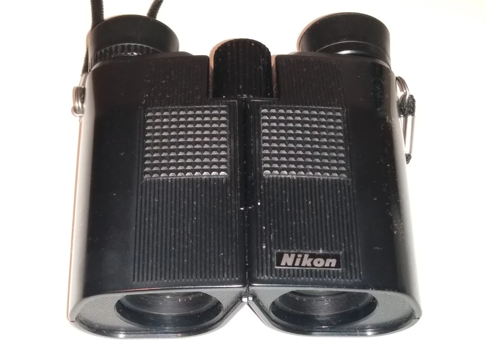 Binoculares compactos Nikon Travelite II 9 x 25 5,6° con estuche blando hechos en Japón Foto 4 de 4