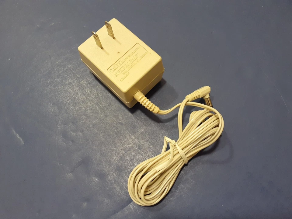 Adaptador de CA Uniden AD-310 9V 210mA para teléfono con cable enchufe de 5,5 mm Foto 2 de 3