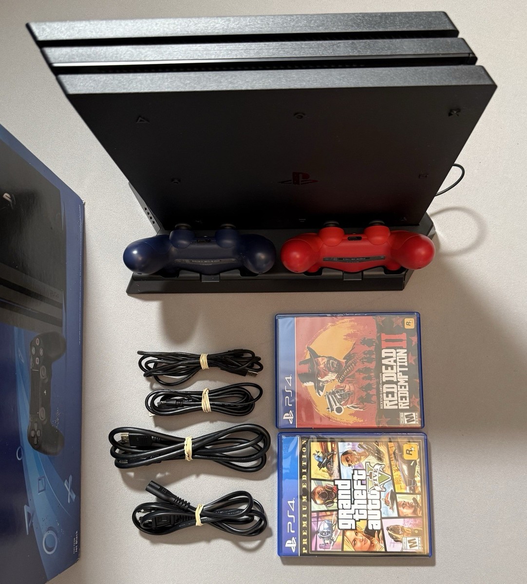 PS4 Pro 1TB Bundle w/ 2OEM Controllers Red Dead 2+GTA V And Stand