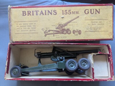 A boxed Britains No.2064 .155mm Gun and a collection of unboxed