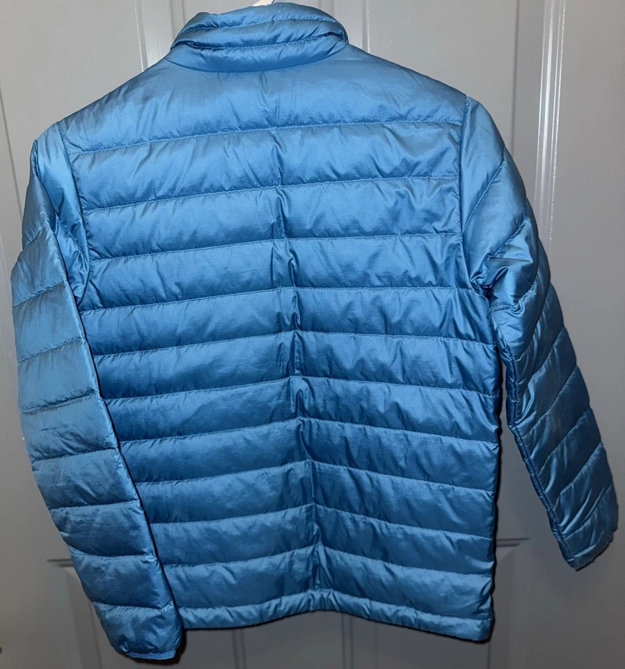This is a Patagonia Down Sweater jacket in a blue color. Size M Kids - Image 2 of 4